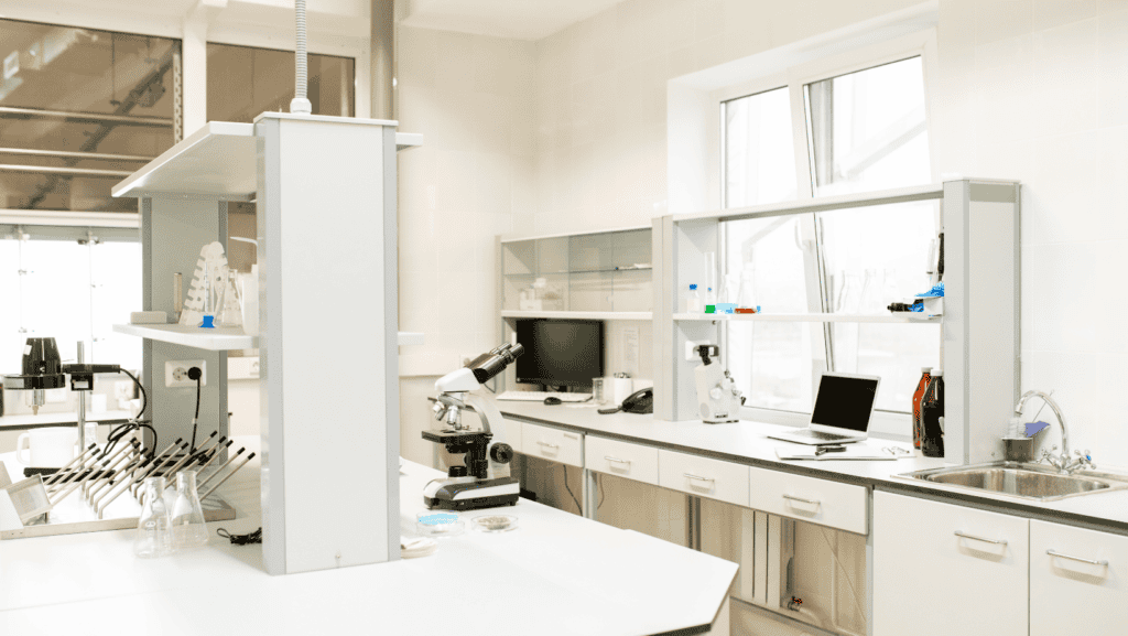 Spotlessly clean laboratory with organised workstations and safety equipment