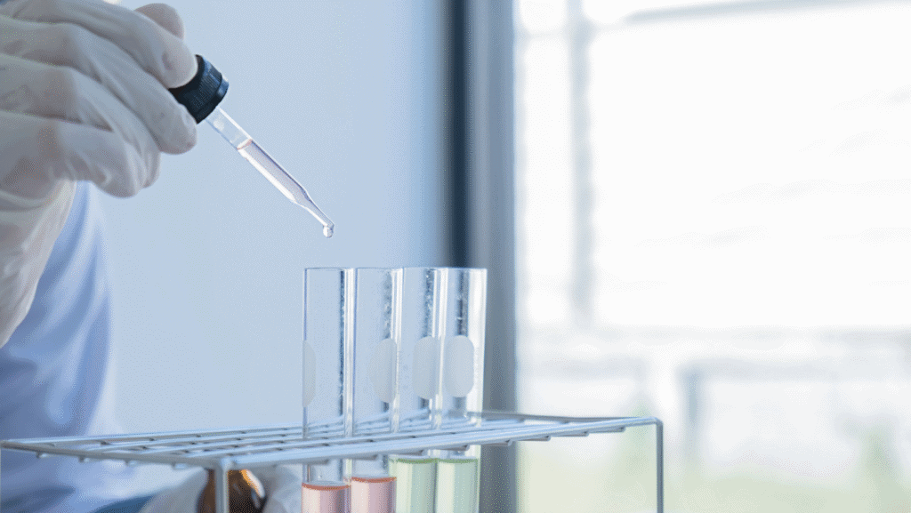 Dropping liquid into test tubes
